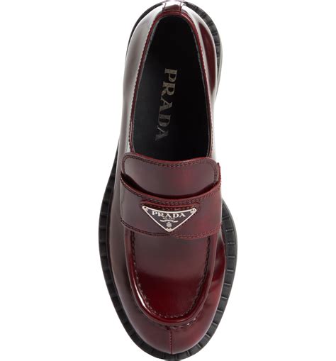 prada triangle logo loafer women.